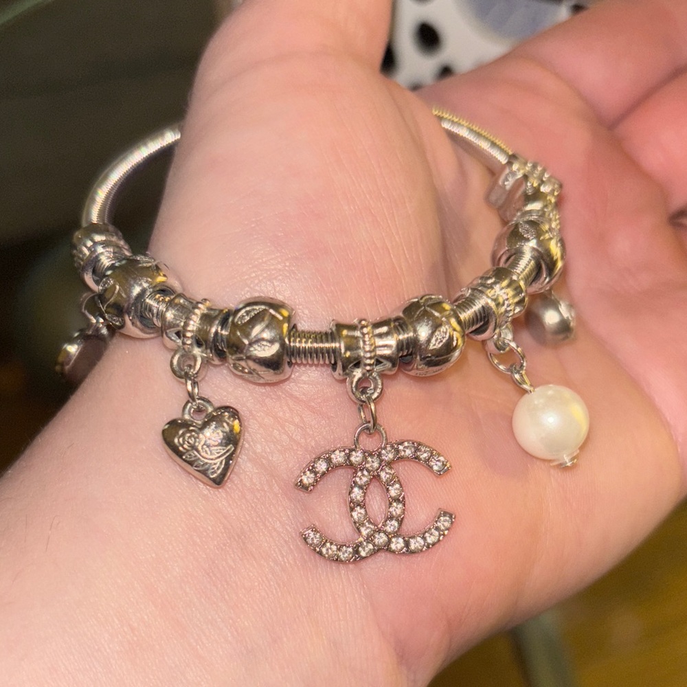 Elegant Silver Charm Bracelet with Heart and Pearl Accents